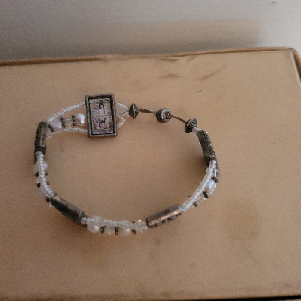 Elegant Beaded Bracelet with Silver Accents